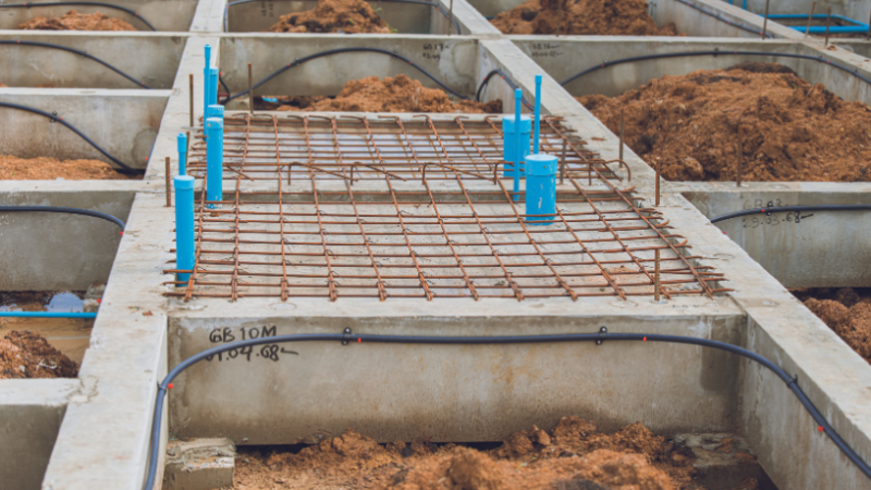 Valderci Malagosini Machado explora como as lajes treliçadas revolucionam a eficiência estrutural em obras residenciais e comerciais.