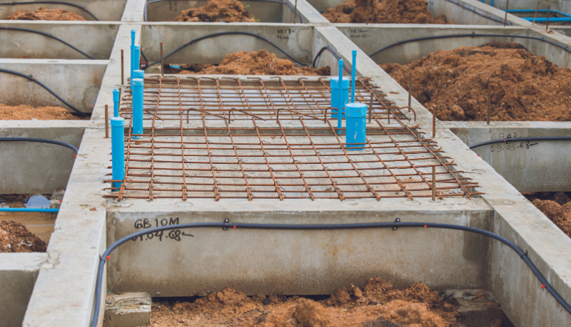 Valderci Malagosini Machado explora como as lajes treliçadas revolucionam a eficiência estrutural em obras residenciais e comerciais.