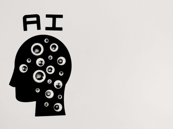 Ilustração de uma cabeça humana em silhueta preenchida por olhos, representando inteligência artificial, observação e privacidade de dados.
